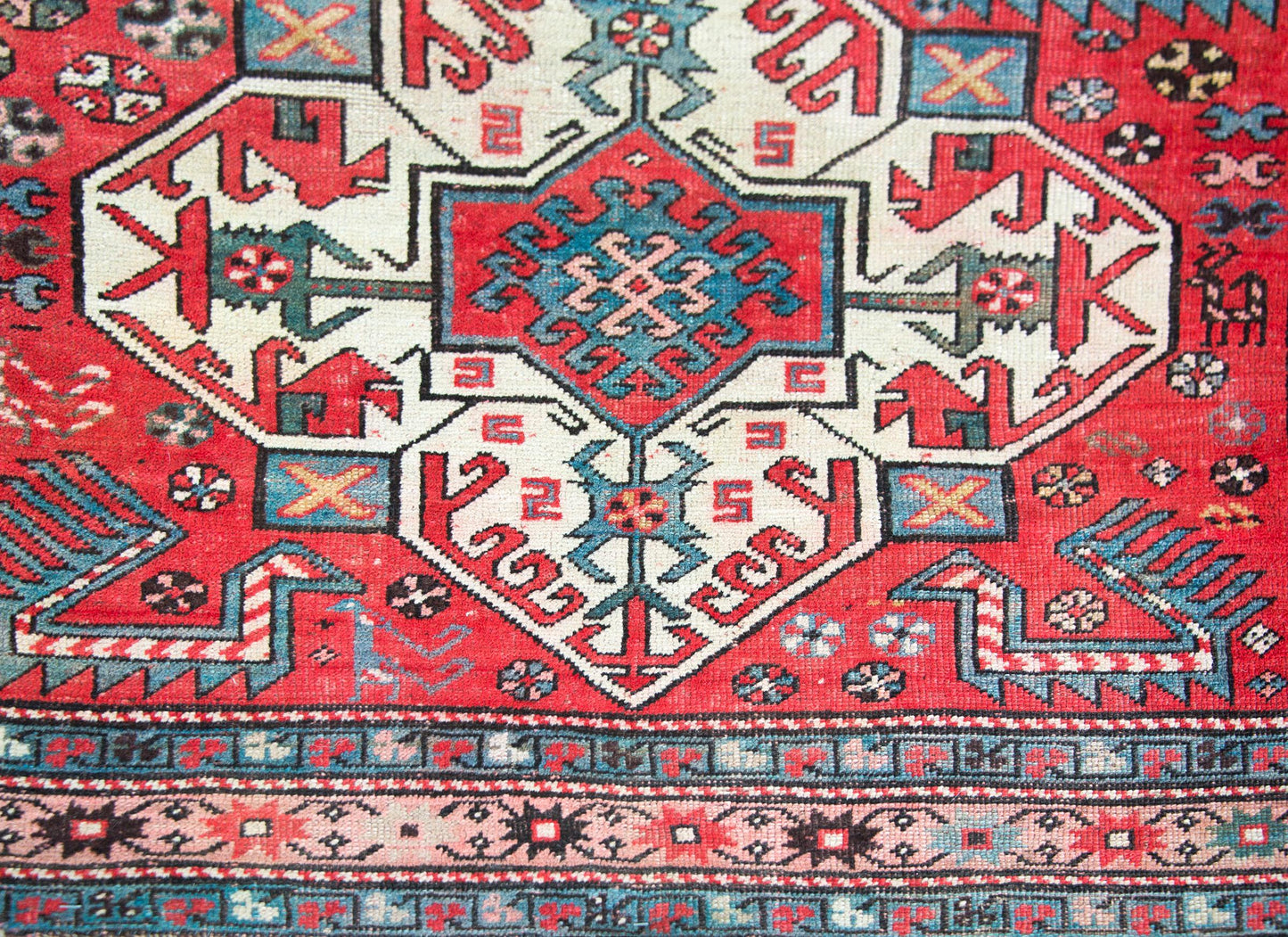Early 20th Century Persian Kazak Rug For Sale