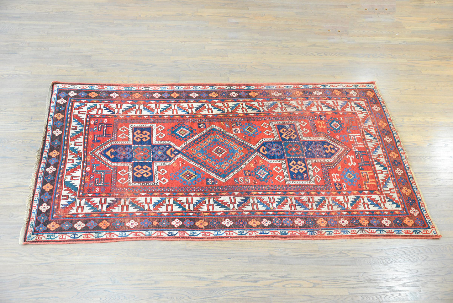 Early 20th Century Persian Kazak Rug For Sale