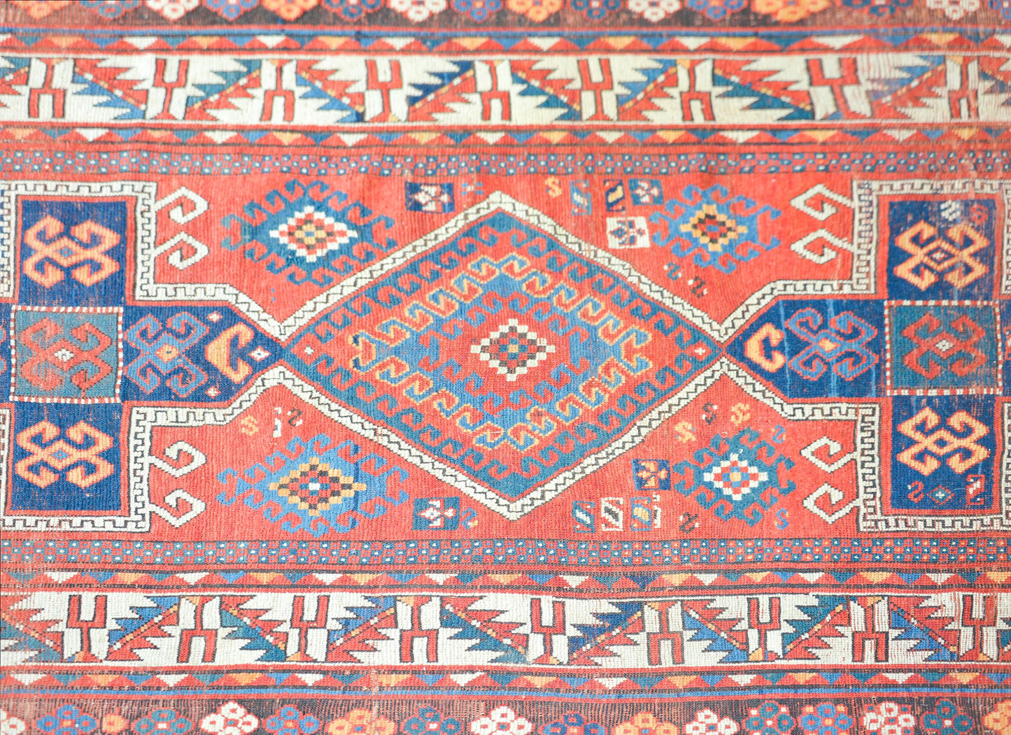 Early 20th Century Persian Kazak Rug For Sale