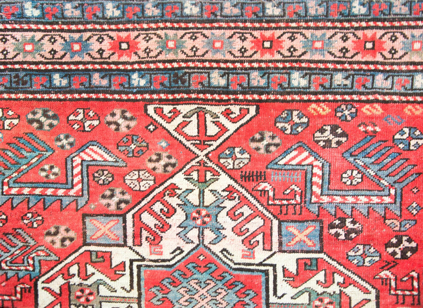 Early 20th Century Persian Kazak Rug For Sale