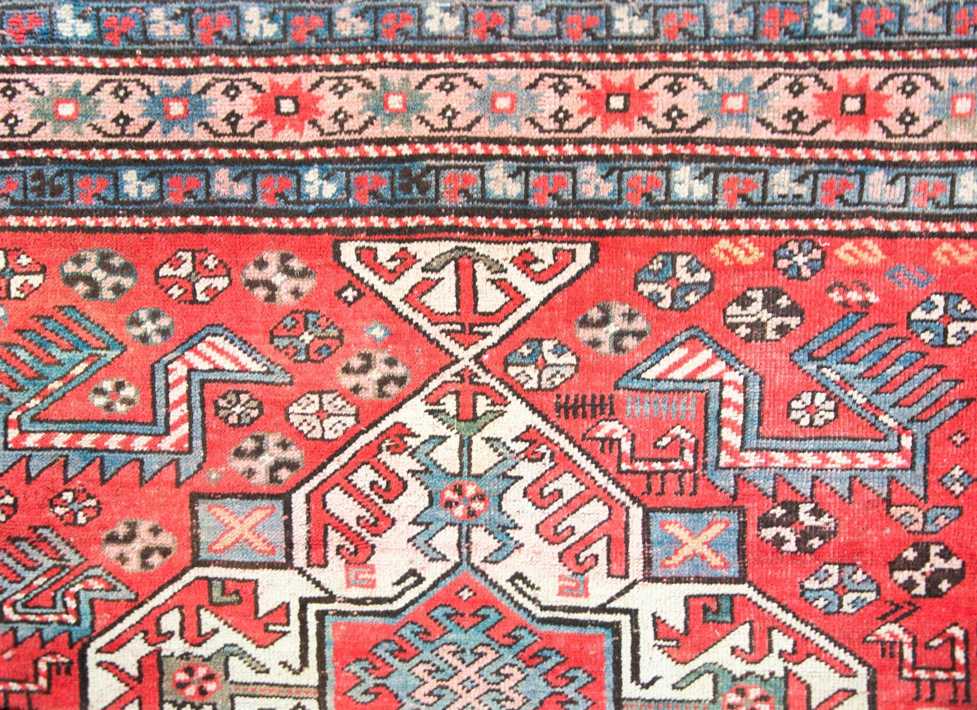 Early 20th Century Persian Kazak Rug For Sale