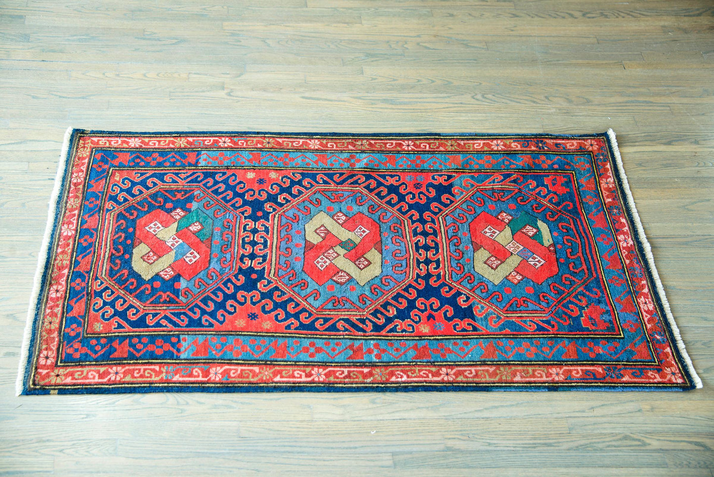 Early 20th Century Persian Kazak Rug For Sale