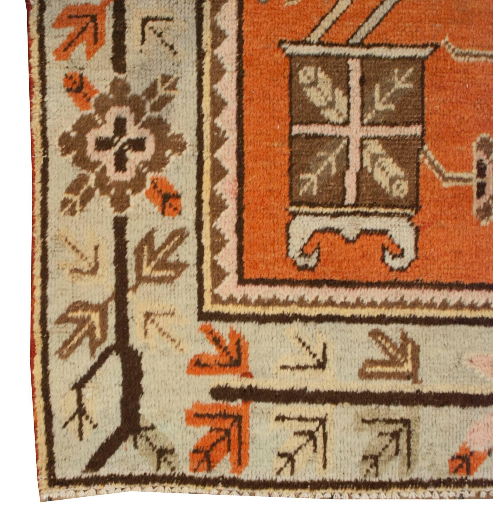 Early 20th Century Pictorial Khotan Rug For Sale